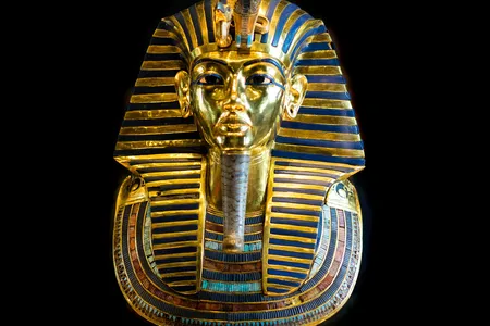 Tutankhamun&#39;s burial mask is made of gold and precious stones.