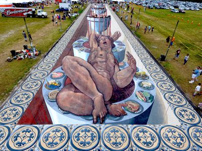 This gigantic piece of chalk art was created by dozens of artists in attempt to snag a Guinness World Record for Largest Anamorphic Pavement Art. 