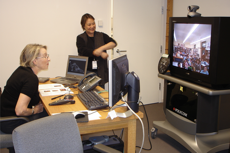 Volunteer Helen Dickerson (L) and staff member Colleen Brown (R) connected with students for virtual lessons from 2004-2011; Photo by SAAM staff.