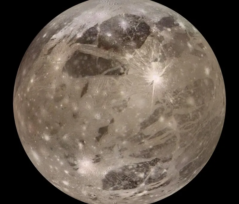 a moon with many crater impacts