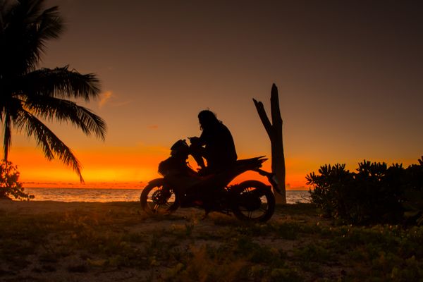 Biker enjoining the sunset thumbnail