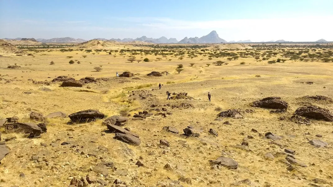 Landscape views of scatters of qubbas around the Jebel Maman