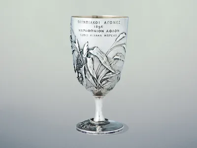 The Br&eacute;al Cup, designed by French scholar Michel Br&eacute;al, was awarded to the winner of the first Olympic marathon.