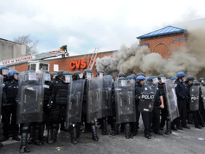 On April 27, 2015, violence broke out in Baltimore, Maryland, where a CVS was set on fire, and at least 15 police officers were injured during clashes with protesters over the death of Freddie Gray, a 25-year-old black man who died of injuries sustained during an arrest. 