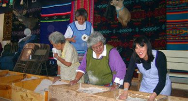 Zuni or not, every woman is obliged to pitch in for the Sha'lako corn-grinding ceremony. During the religious festival, says Morell (far right), "people are expected to set aside all feelings of ill-will and hostility."