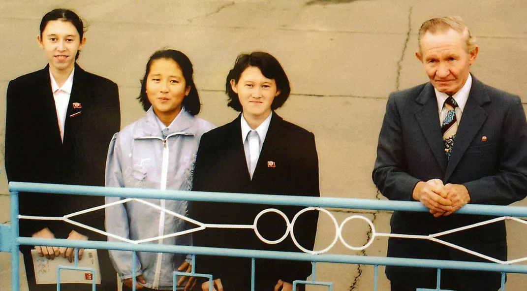 A 2002 photo of Charles Robert Jenkins and his daughters, Mika (far left) and Brinda (second from right), as well as Kim Hye-Gyong (second from left), the daughter of a Japanese abductee