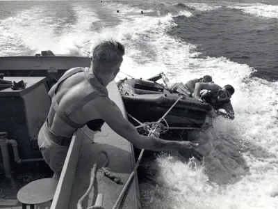 The&nbsp;so-called frogmen swam into enemy beaches unarmed, wearing only swim trunks, dive masks and fins.