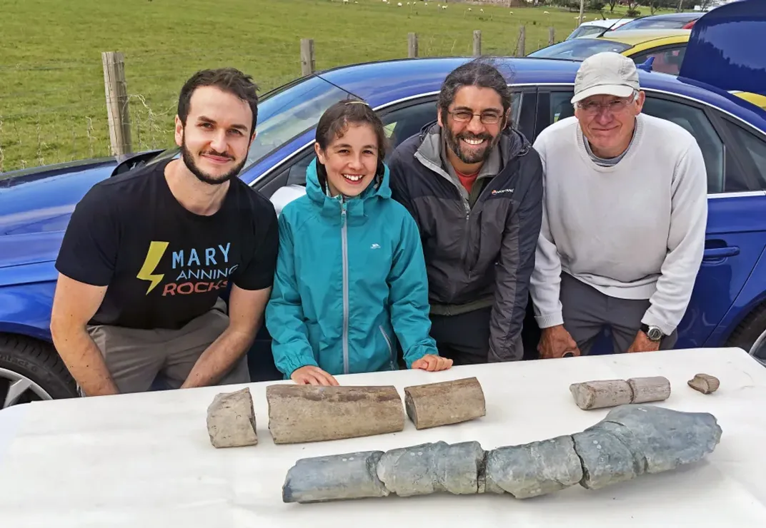 Dean Lomax, Ruby Reynolds, Justin Reynolds, and Paul de la Salle in 2020 with the newly discovered fossils and the fossil discovered in 2016.