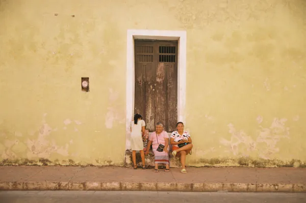 Adorable family of woman chilling on the street of Valladolid. thumbnail