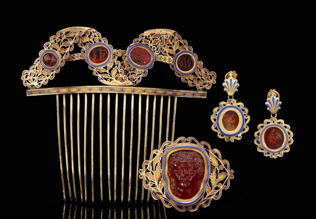 A hair comb, pendant earrings and belt ornament likely once owned by Empress Josephine