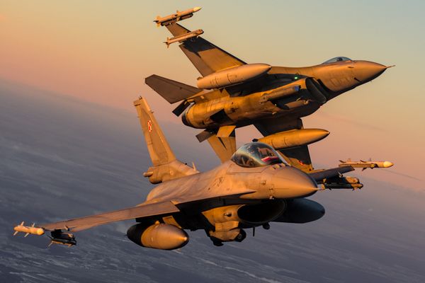 F-16s at sunset over Lithuania thumbnail