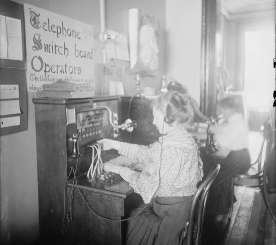 Women at telephone switchboards in the early 20th century