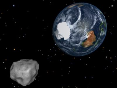 Artist's conception of asteroid 2012 DA14 passing  through the Earth-moon system on Feb. 15, 2013.