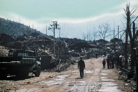 The main gate of the Xichang launch center, after the accident. American visitors saw hundreds of people gathered here before the launch. Chinese officials claimed they were evacuated in time.
