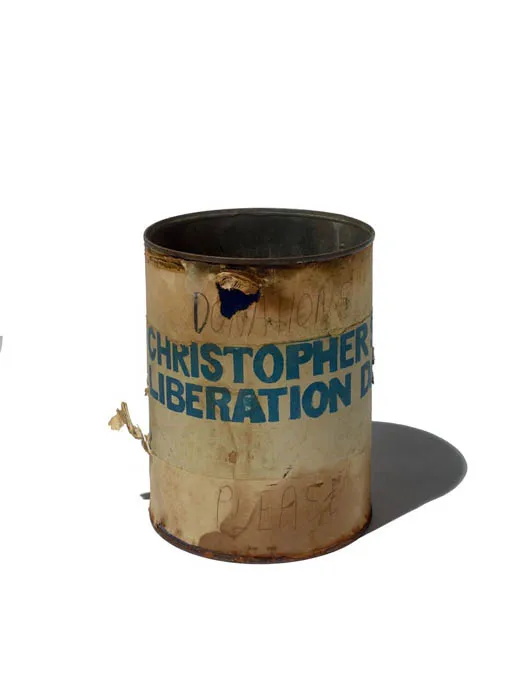 Aluminum can painted with "Christopher Liberation"