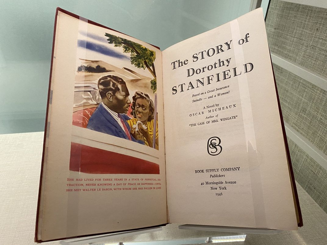 Book, "The Story of Dorothy Stanfield", open to title page and frontispiece. Frontispiece illustration shows an African American man and women riding in convertible.