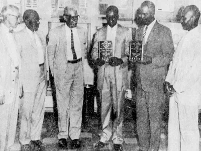 A 1959 photograph of William &quot;W.R.&quot; Saxon, who is standing third from left