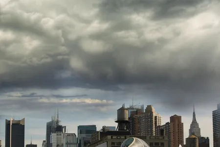 Complementing the New York City skyline, from right: a McDonnell F3H Demon, Vought F-8 Crusader, Grumman A-6 Intruder, and Grumman F-14D Super Tomcat.

