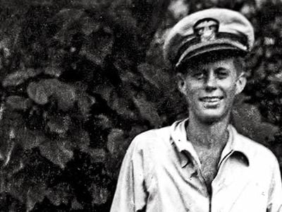 John F. Kennedy, with cane in the Pacific, 1943, would later downplay his PT-109 role: "It was involuntary," he quipped. "They sank my boat."