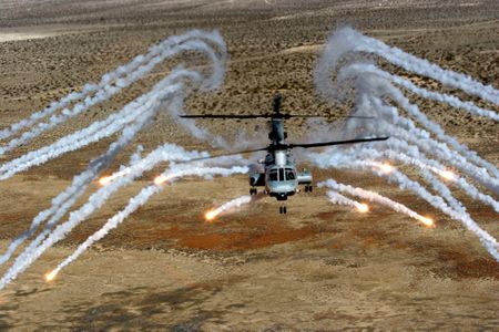 A CH-46E Sea Knight throws out infrared countermeasures during 2009 tests at the White Sands Missile Range in New Mexico.