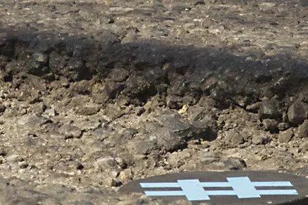 Here you see the tweeting pothole device in place.