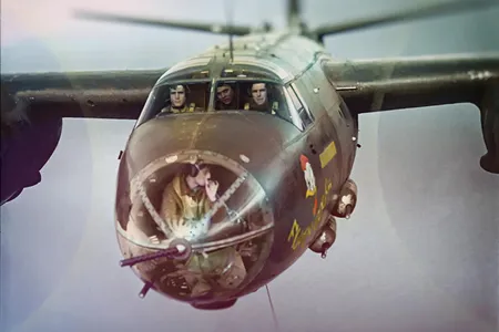 Even in the nose section of a Martin B-26B Marauder, an airman could take a drag. The nose gunner of the B-26 Fightin' Cock, based in the U.K. with the 9th Air Force, smokes during a mission.
