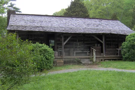The General Bunch house, which was originally located in the New River area of Anderson County, was the first log cabin to be acquired by Irwin, reconstructed, and put on display at the site that was to become the Museum of Appalachia.