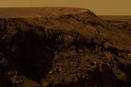 On the edge of a Martian crater.