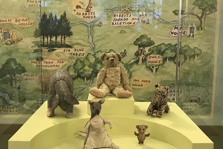 Winnie-the-Pooh and his friends live in a case at the New York Public Library.