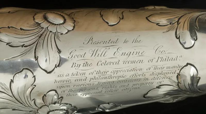 Engraving on an ornamental silver trumpet, which reads  "Presented to the Good Will Engine Co. By the Colored women of Philadelphia as a token of their appreciation of their manly, heroic, and philanthropic efforts displayed upon various trying occasions
