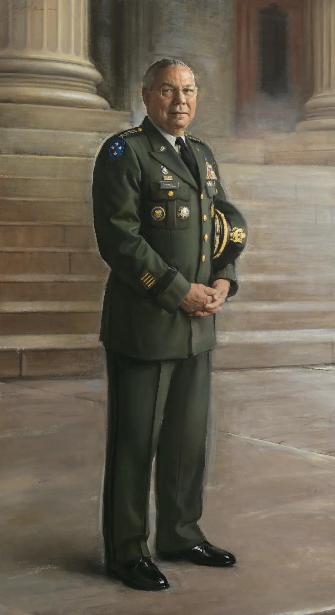 A full length portrait of Powell, standing in green military garb and black shoes, hands folded in front of him and looking at the viewer