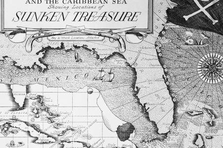 Photo shows a section of the Florida-Caribbean map. In lower left, an insert section shows part of the Caribbean treasure ground. Note heavy concentration of numbers (each location a shipwreck) off the Louisiana coast, and in the Florida Keys.