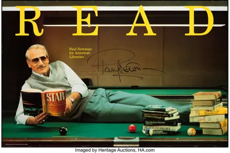 Actor Paul Newman lounges on a pool table reading Star Warriors in this ALA READ campaign poster.&nbsp;