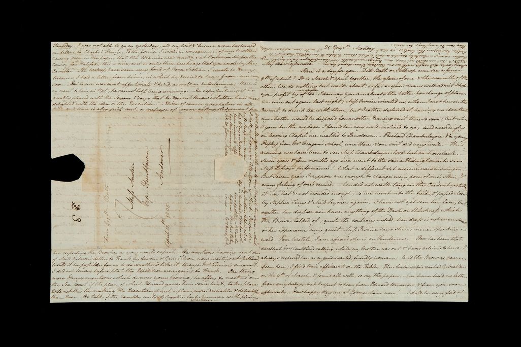 Two-page letter against a black background