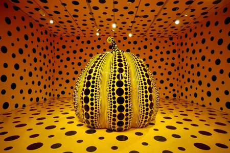 A large pumpkin sculpture by Yayoi Kusama, on view at the Smithsonian's Hirshhorn Museum and Sculpture Garden in 2023. The Japanese artist died this month.