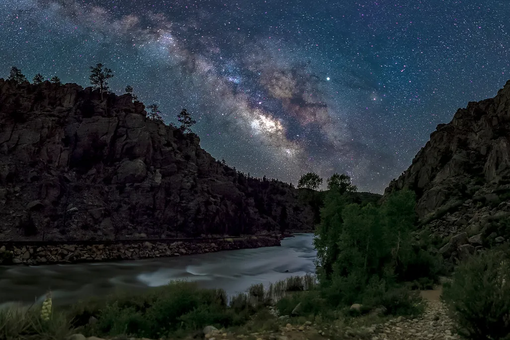 Milky Way visible over river