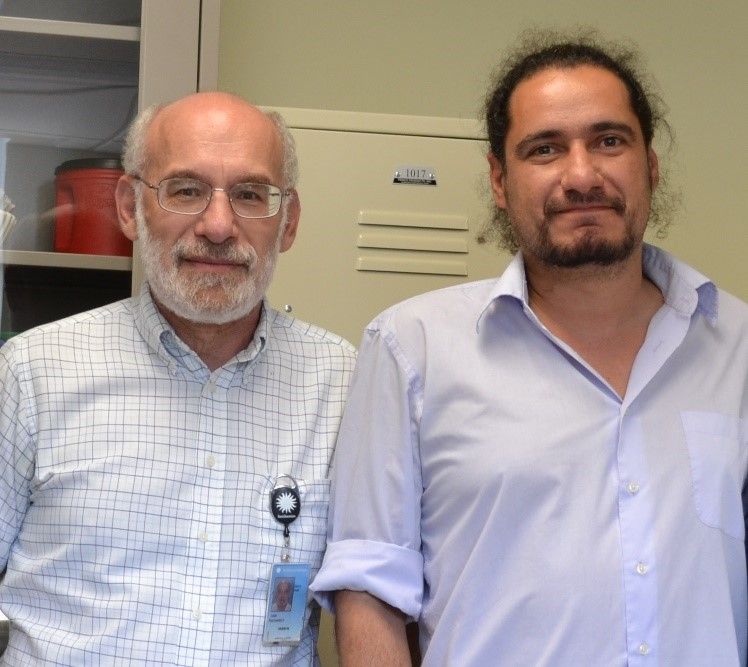 David de Santana poses for a picture with his mentor Richard Vari at the Smithsonian's National Museum of Natural History. 