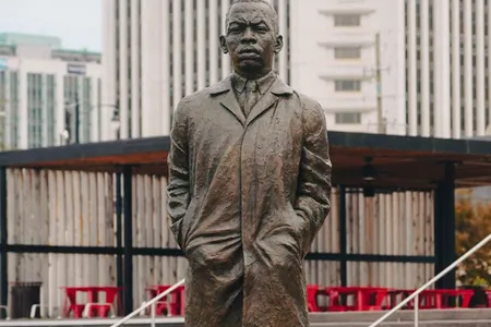 Steadfast Stride Toward Justice by artist&nbsp;Basil Watson is&nbsp;the first life-sized depiction of John Lewis in his home state.