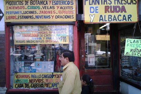A man walks by a botanica, a store stocking medicinal plants, in Chicago.