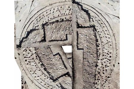 Archaeologists have excavated about one-third of the 66-foot wide timber circle, shown on the right. The other portion of this composite image draws on an aerial photograph to give a sense of the structure's size. 
