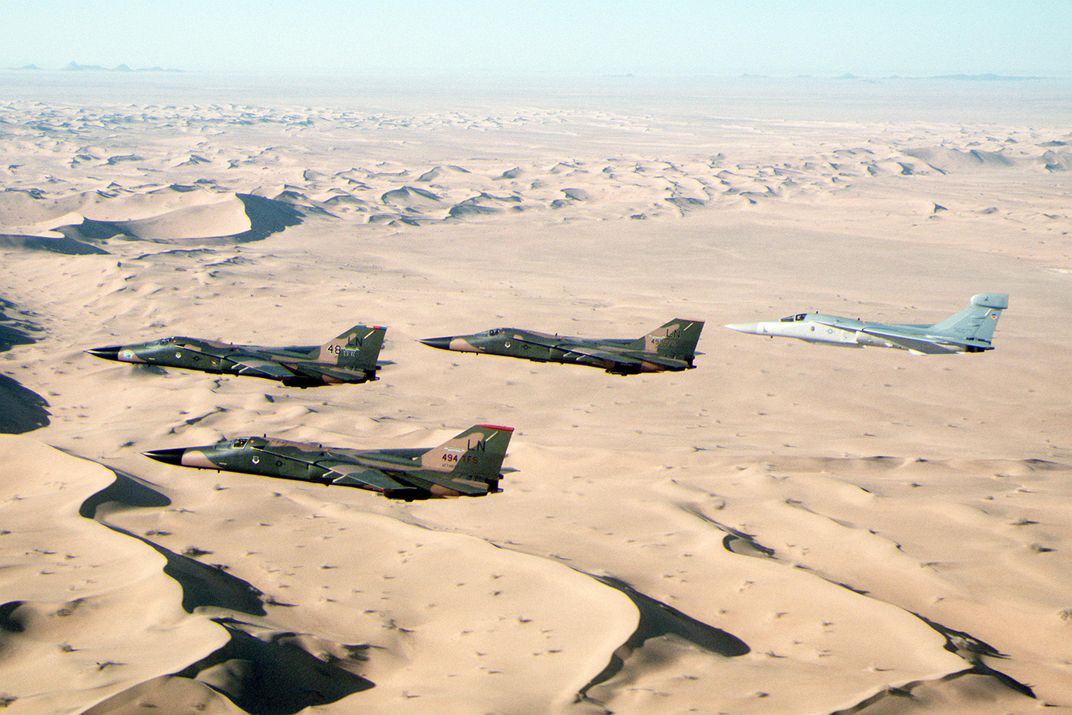 3 F-111F aircraft and an EF-111A Raven