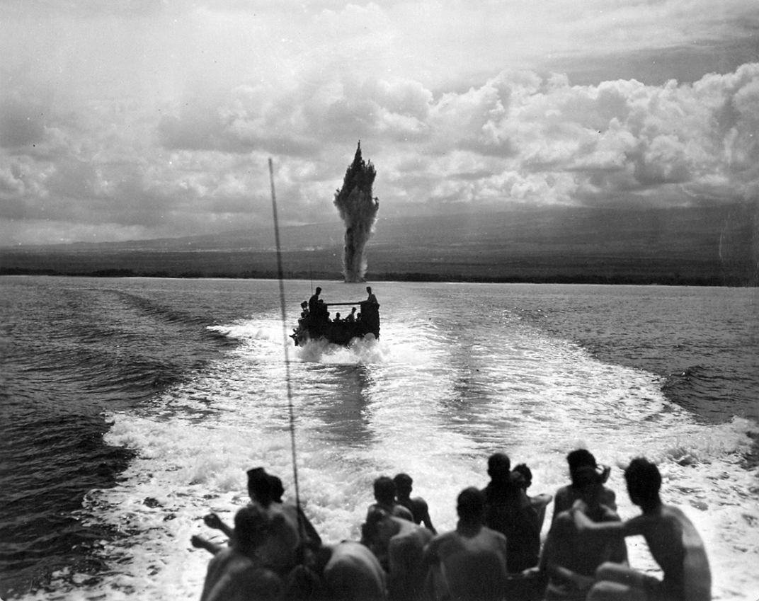 UDT men returning from a successful demolition mission off Saipan