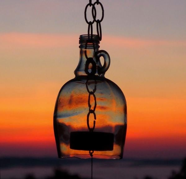 A wind chime refracting the dawn thumbnail