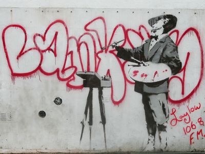 The secretive street artist Banksy painted this graffiti mural in London in 2008.
