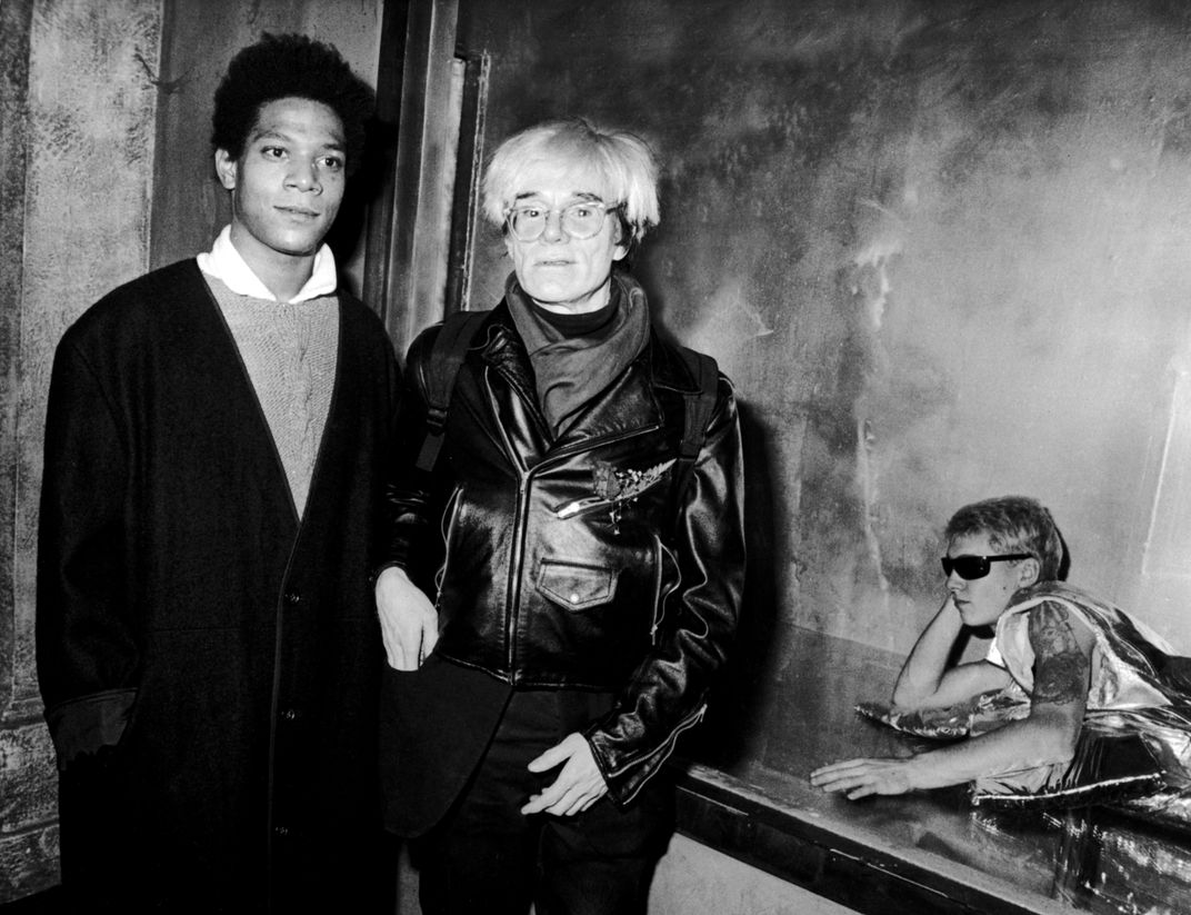 Jean-Michel Basquiat and Andy Warhol attend "Gifts For The City Of New York" Benefit for Brooklyn Academy of Music