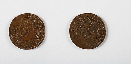 A team of Smithsonian scientists excavating the Hart Chalet site found a double tournois copper coin minted for French King louis XIII in 1634.  In pristine condition, it would have looked similar to this 1638 double tournois coin. (Images courtesy of the National Numismatic Collection, National Museum of American History, Smithsonian Institution. Image composite by Anna Torres)