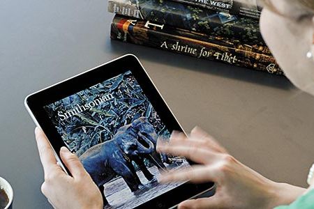 Kevin Kelly worries devices like Apple's iPad, shown here with Smithsonian's first cover, nurtures action over contemplation.