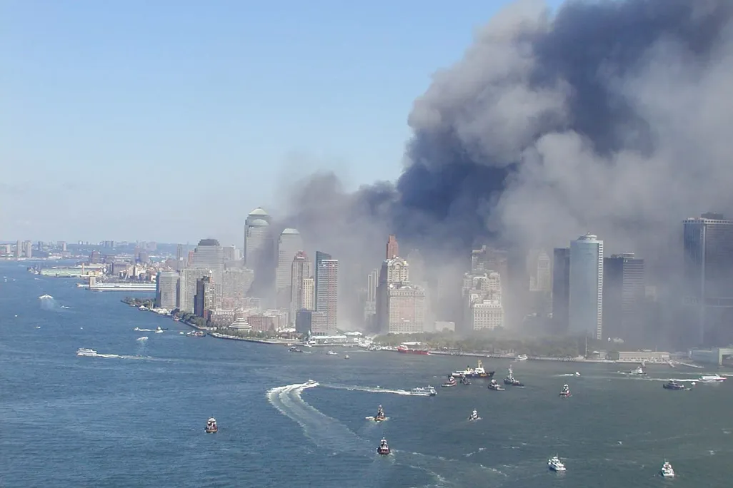 view of Manhattan with smoke cloud from the water
