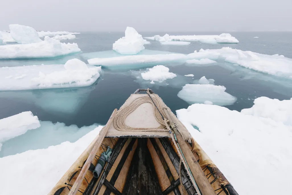 Arctic ice and fishing boat