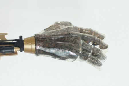 Stretched over a prosthetic hand, this artificial skin acts more like the real thing than anything before it.